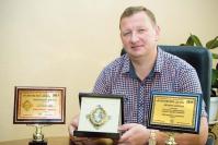 Председатель правления ЗАО «Комбанк Арзамас» А. Князев с наградами